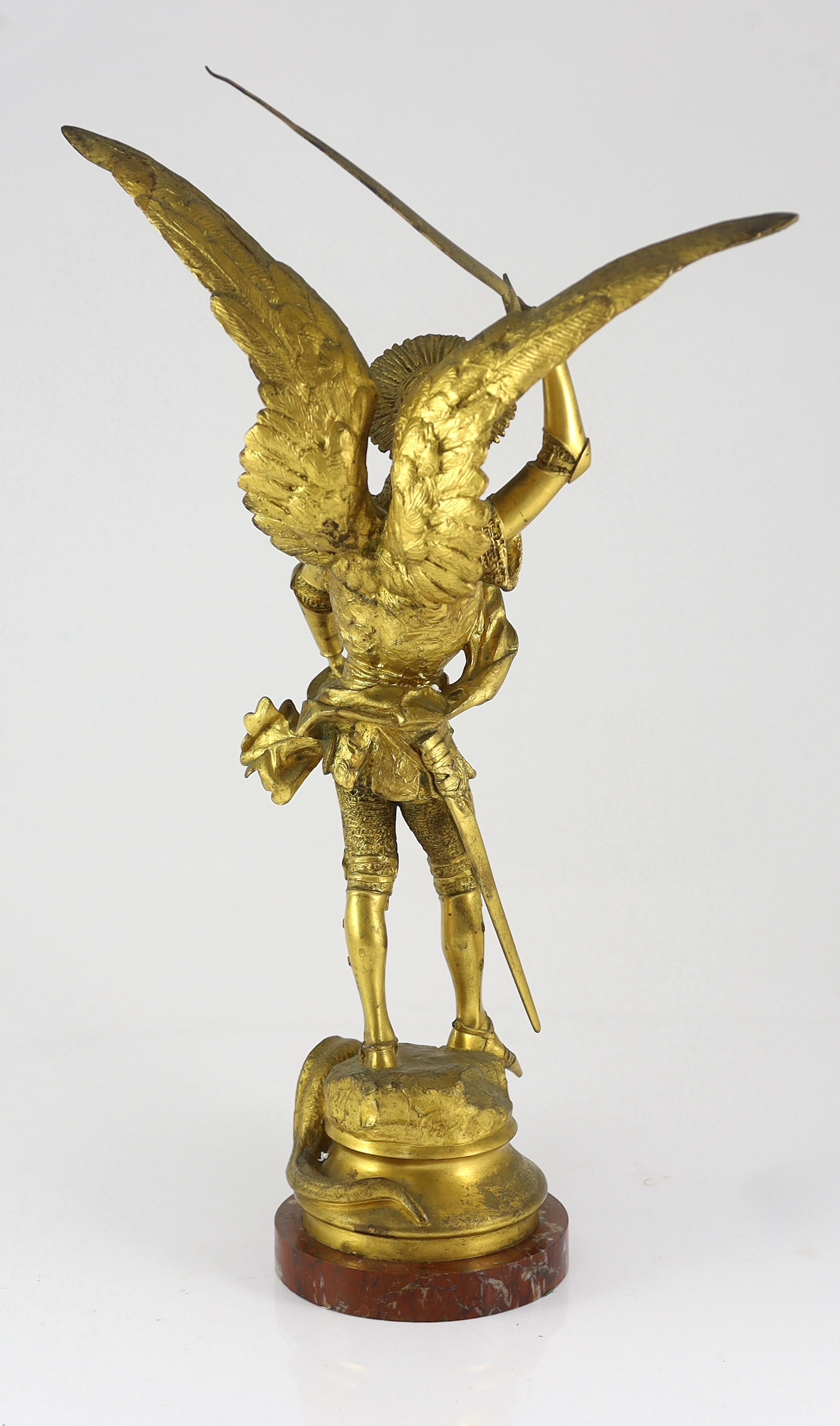 Emmanuel Fremiet (French, 1824-1910). A gilt patinated bronze, St Michael and the dragon, 34cm wide, 56cm high